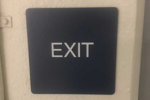 ada-compliant evacuation sign