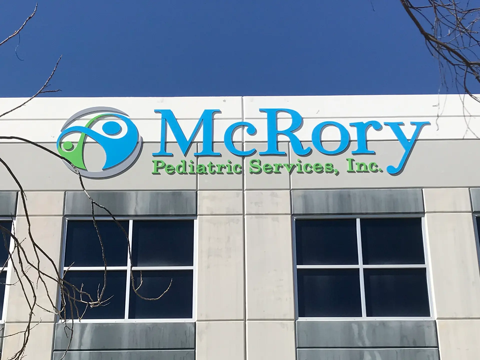 commercial building with lighted sign