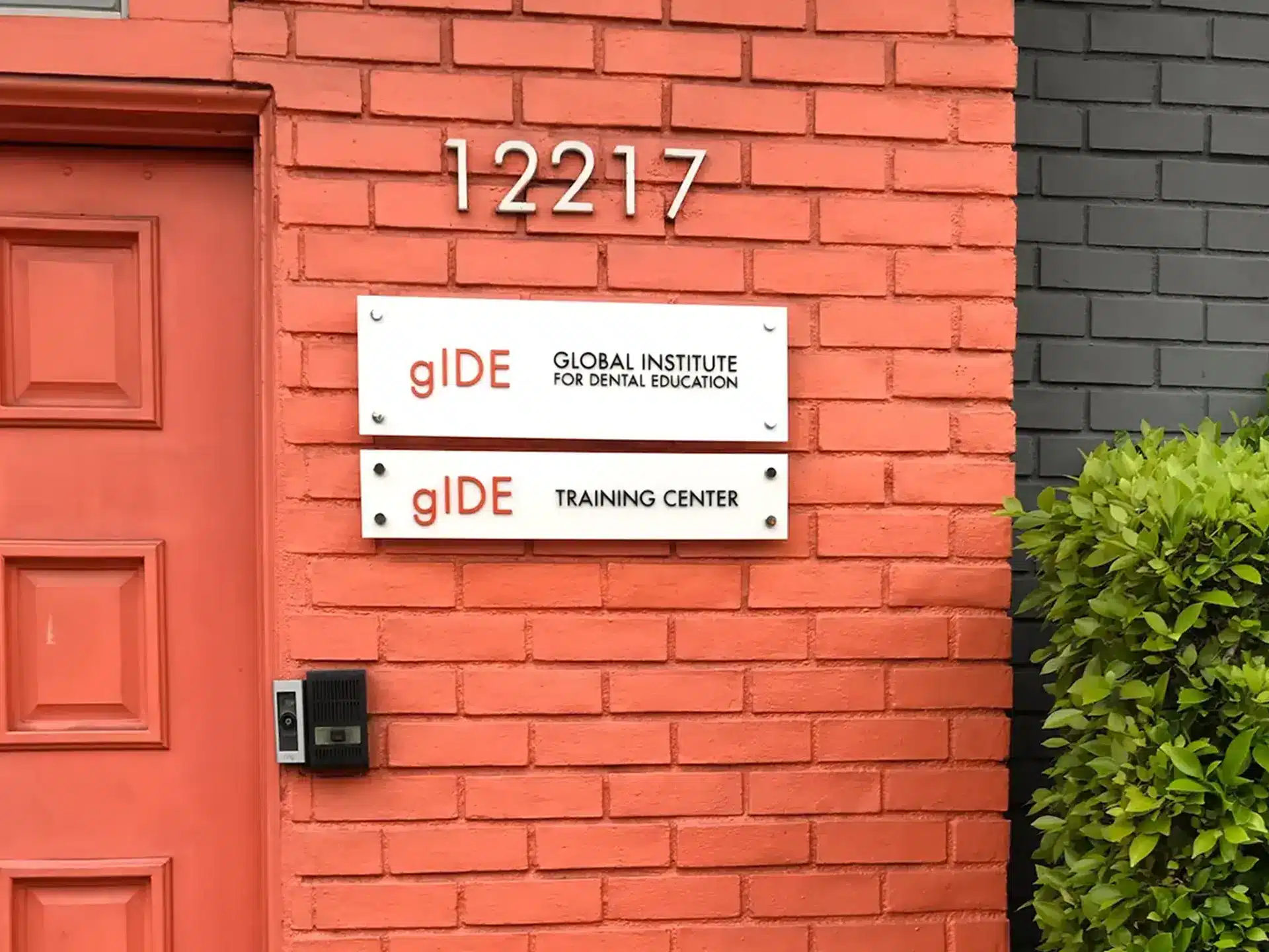 building sign showing business address