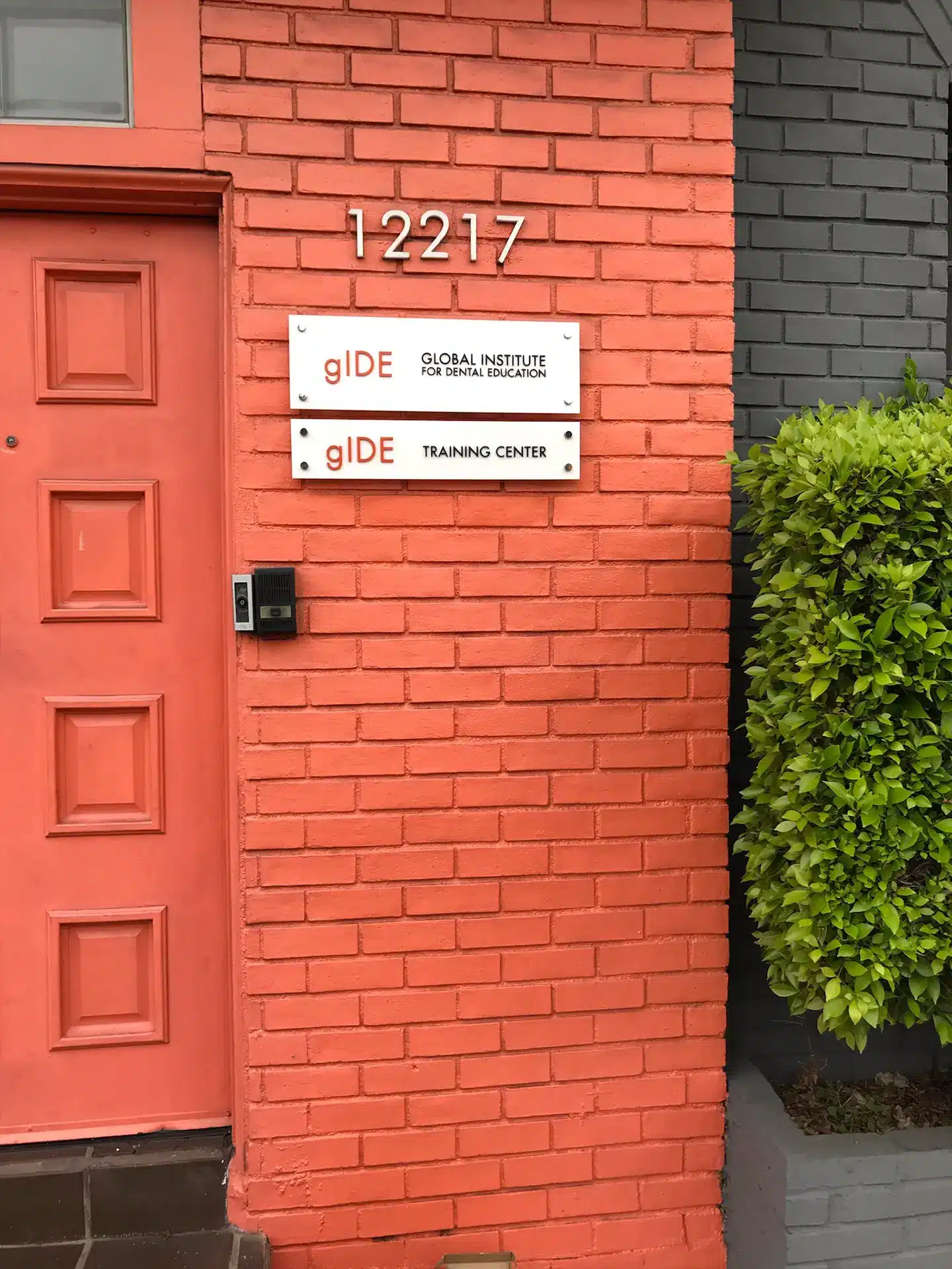 orange building sign showing business address