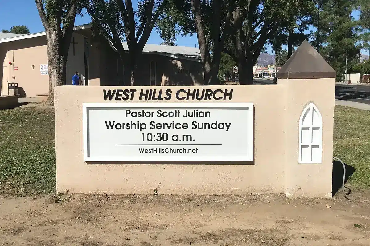 An outdoor church sign for west hills church